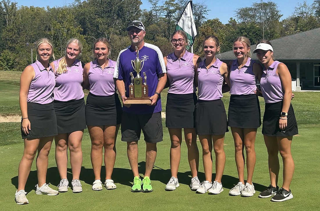 The Fort Recovery High School girls golf team poses with the MAC championship award. FRHS won its first girls golf MAC title on Saturday. (Special To The Commercial Review/Amy Bihn)