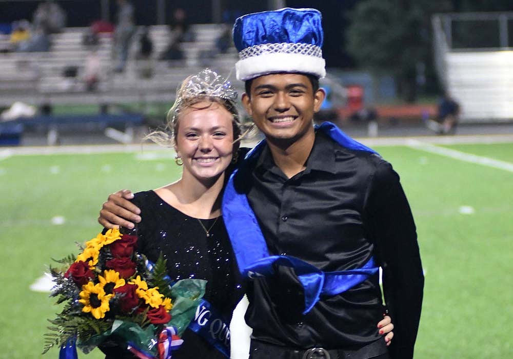 Jay County High School crowned Morgan DeHoff and Dylan Marentes as its homecoming queen and king during halftime of Friday night’s football game against the Woodlan Warriors. Both are soccer players for the Patriots. (DeHoff was also announced earlier in the day as a finalist for the Lilly Foundation Community Scholarship along with fellow homecoming court members Coryn Blalock and Maddy Snow, as well as Aubrey Millspaugh and Ella Stockton.) (The Commercial Review/Ray Cooney)