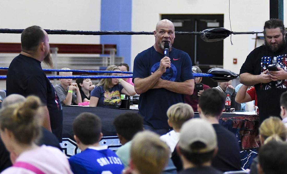 Former professional wrestler and Olympic gold medalist Kurt Angle addresses the crowd Saturday night at the beginning of Delaware County Championship Wrestling Invasion V at Jay Community Center. Angle spent time earlier in the day with members of Jay County Wrestling Club, sharing advice from his career. (The Commercial Review/Ray Cooney)