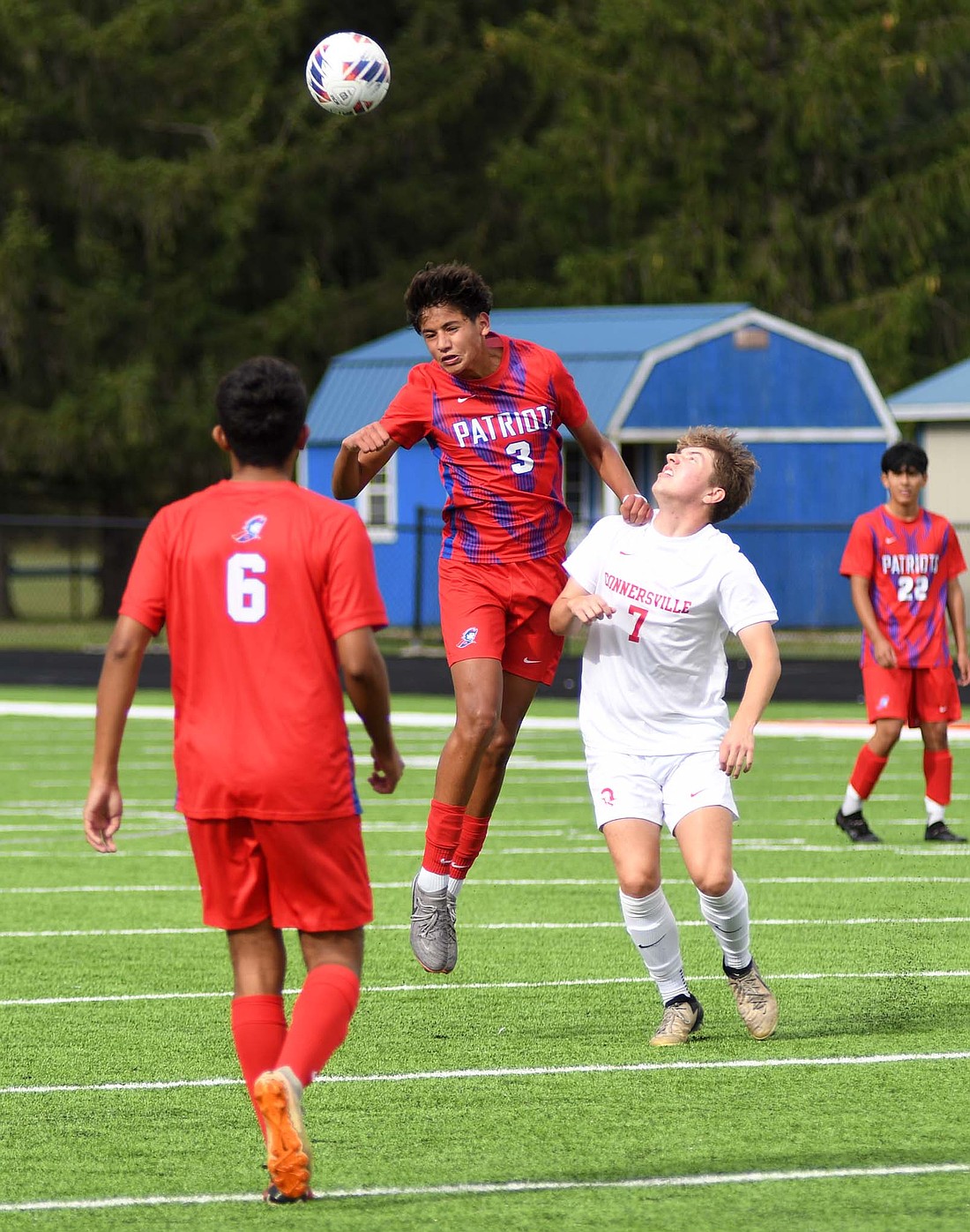 Jay County High School’s Aryan Montes heads a ball during the Patriots’ 4-3 win over Connersville on Saturday. Montes scored the second goal for the Patriots on a free kick. (The Commercial Review/Andrew Balko)