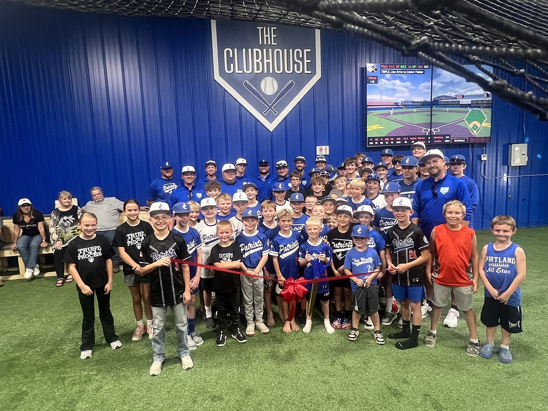 Jay County Baseball Club held a ribbon-cutting ceremony and open house Saturday for The Clubhouse, its new indoor training facility for outdoor sports. The facility at 822 S. 500 West, Portland, is open, with memberships available. (The Commercial Review/Andrew Balko)