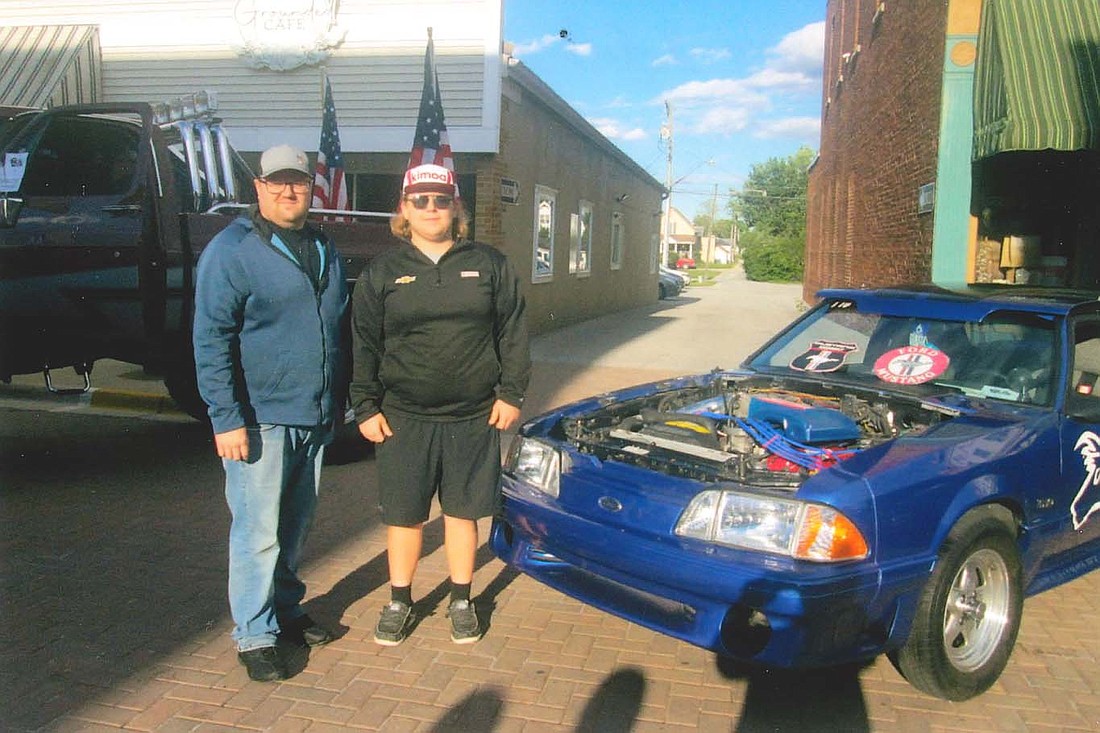 Fort Street Car Classics awarded a $500 scholarship to Brayden Bonifas, pictured above (right) with car club president John Jutte. Fort Street Car Classics will host a cruise-in from 4 to 8 p.m. Saturday in downtown Fort Recovery. (Photo provided)