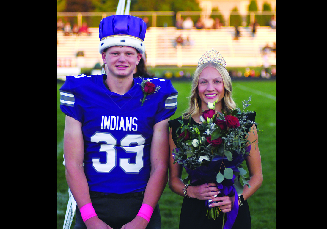 Fort Recovery High School crowned Gavin Evers and Anna Roessner as its homecoming king and queen prior to the football game against Parkway on Friday. Evers made up for a poor kickoff by jumping on the ball and recovering it for the Indians after an offensive touch to help them secure a 36-24 victory. For more on the game, see page 10. (The Commercial Review/Andrew Balko)