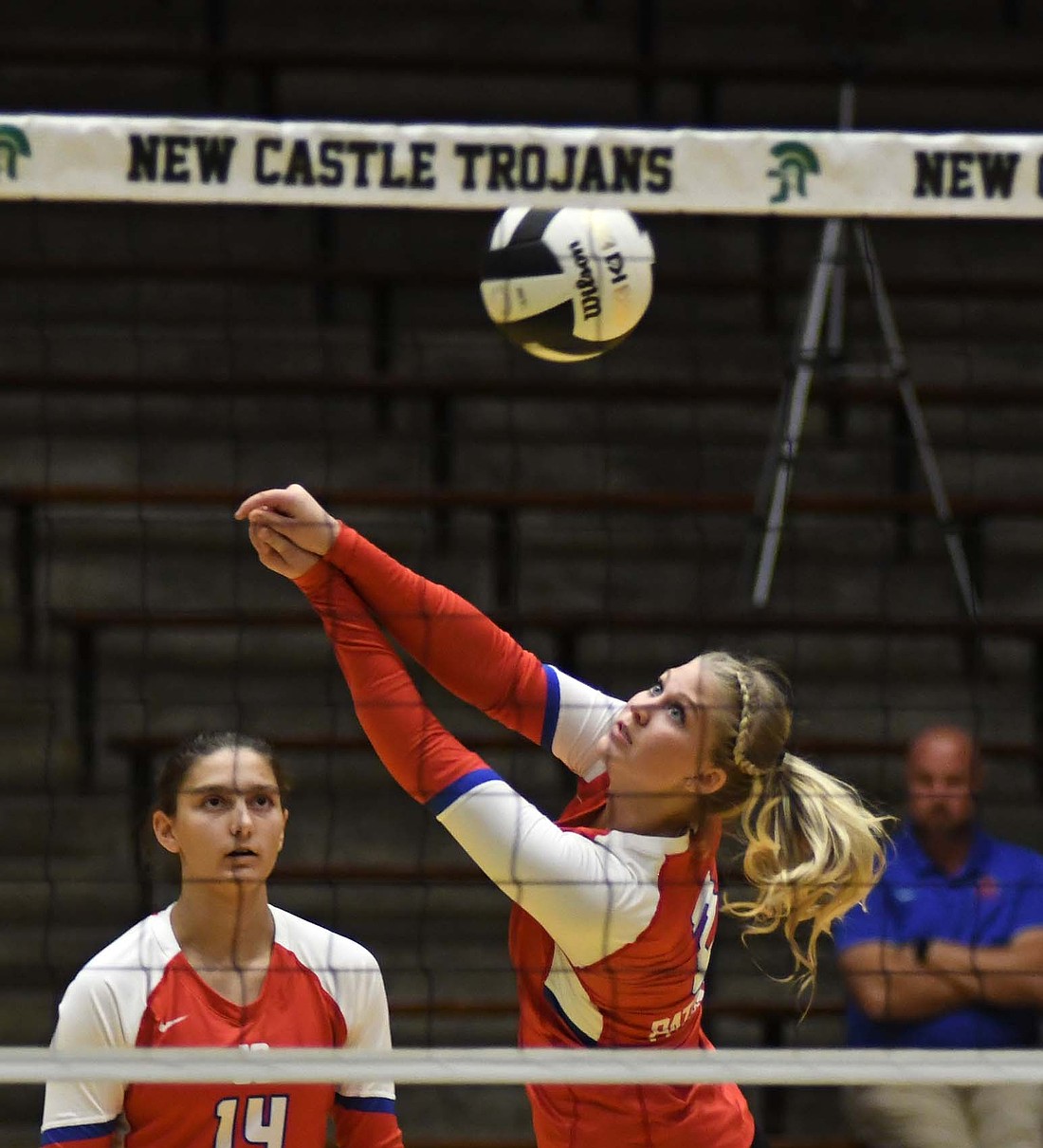 Jay County High School junior Elizabeth Barnett sends a free ball over during the IHSAA Class 3A Sectional 24 championship match at New Castle on Saturday. Barnett had six kills and 12 digs in the four-set loss. (The Commercial Review/Andrew Balko)