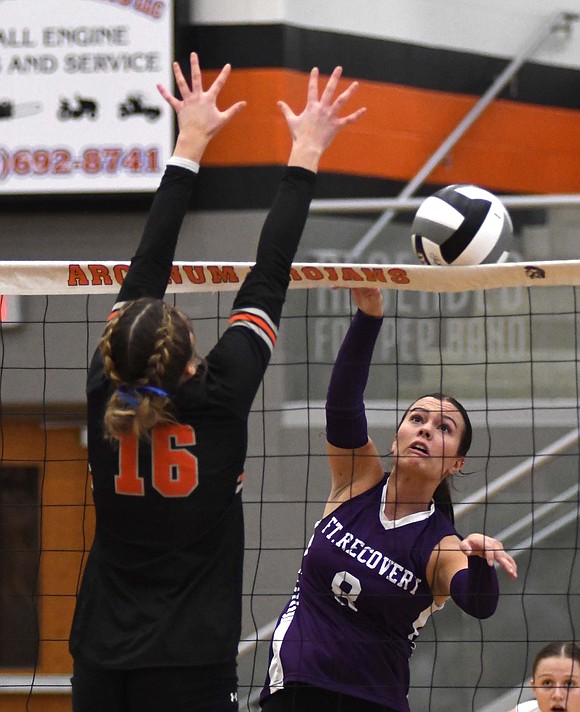 Kayla Heitkamp, a senior on the Fort Recovery High School volleyball team, takes a rare swing at the ball during the Division VI Southwest 2 district semifinal at Arcanum on Wednesday. The setter had three aces and 28 assists in the sweep. (The Commercial Review/Andrew Balko)