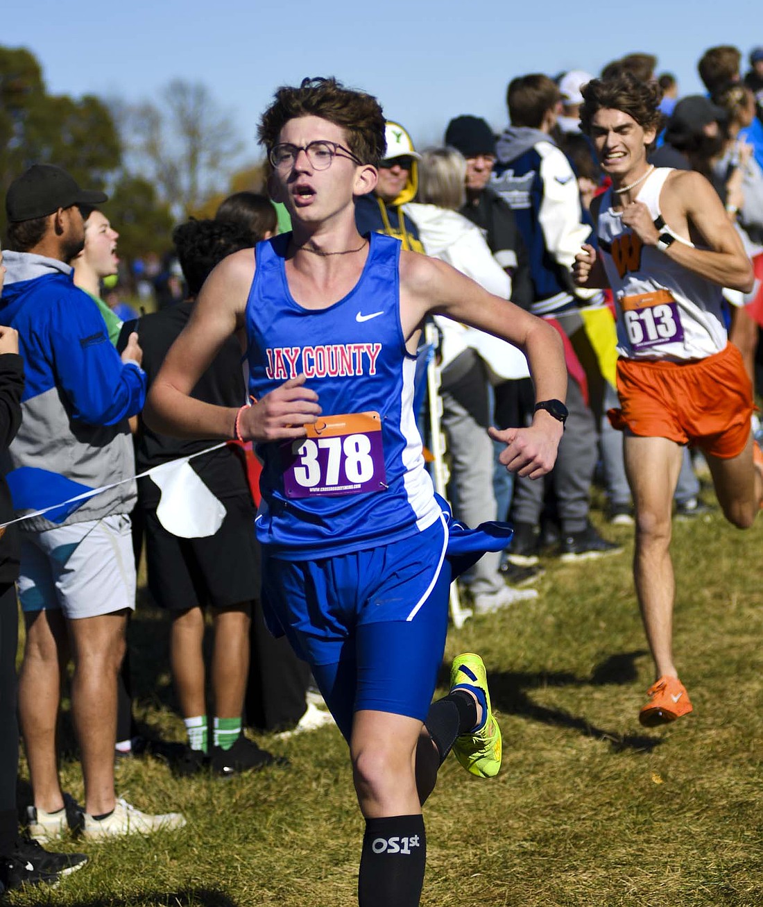 Jay County High School sophomore Caleb Garringer competes during the IHSAA Regional cross country meet at Huntington University on Saturday. Garringer’s time of 16 minutes, 48.1 seconds left him 10 places and 13 seconds short of a state berth. (The Commercial Review/Ray Cooney)