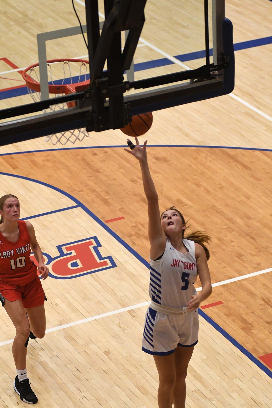 Jay County High School’s Alexis Sibray puts up a transition layup during the Patriots scrimmage against Huntington North on Nov. 5. The Patriots open their season today with a trip north to South Side. (The Commercial Review/Andrew Balko)