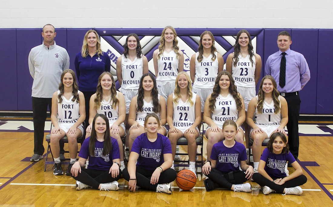 Pictured is the 2024-25 Fort Recovery High School girls basketball team. Front row from left are managers Rihanna Wuebker, Zoey Wendel, Brooklyn Wuebker and Rhea Steinbrunner. Middle row are Brooke Bihn, Emma Schmitz, Madie Schoenlein, Makenna Huelskamp, Ivy Tobe and Paisley Hart. Back row are assistant coaches Brent Niekamp, Mandy Gerlach, Cameron Muhlenkamp, Kennedy Muhlenkamp, Karlie Niekamp, Bridget Homan and coach Tyler Deitsch. (The Commercial Review/Andrew Balko)