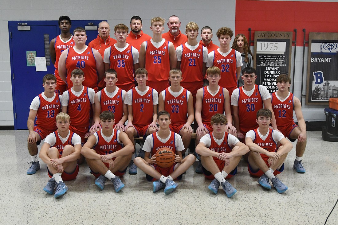 Pictured is the 2024-25 Jay County High School boys basketball team. Front row from left are Benson Barnett, Drew Schemenaur, Zavier Hudson, Boston Barnett and Rylee Sollars. Second row are Brady Jetmore, Jayden Comer, Eli Dirksen, Jacob Monroe, Nick Snow, Brock Wasson, Aiden Phillips and Carter Fugiett. Third row are Kade Sommers, Gradin Swoveland, Cole Forthofer, Eli Petro and Tucker Griffin. Back row are Caden Gambill, coach Jerry Bomholt, assistant coaches Brogan Gary, Doug Arbuckle, Luke Goetz and manager Bailey Towell. (The Commercial Review/Ray Cooney)