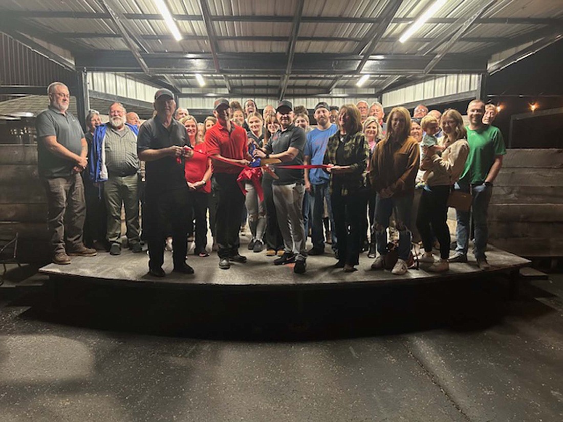 Jay County Chamber of Commerce recently held a pair of ribbon-cutting ceremonies. Pictured, the chamber celebrated with Firehouse BBQ and Blues of Dunkirk. The new restaurant is located at 126 E. Commerce St. (Photo provided)