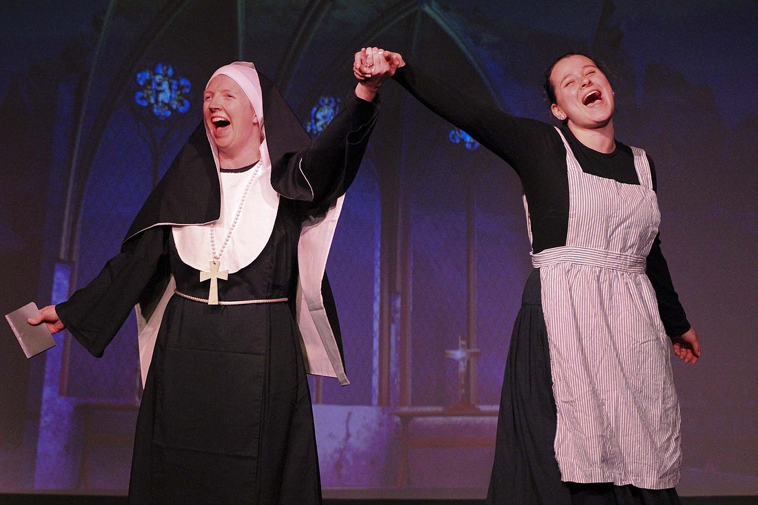 Julie Crandall (left) and Rachel Tebbe (right) perform as Mother Abbess and Maria Rainer, respectively, during a rehearsal last week for Jay County Civic Theatre’s production of “The Sound of Music.” Crandall played Maria the last time JCCT put on the Rogers and Hammerstein classic in 2008. The current production will open Thursday at Arts Place. (The Commercial Review/Bailey Cline)