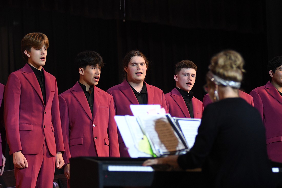 Wyatt Mock, Ashton Castillo, Elijah Sutton and Daniel Hummer sing Sunday during a performance of “Hallelujah” at the Jay County High School music department Christmas concert. Other selections from the JCHS choirs included “White Christmas,” “Veni, Veni Emmanuel” and “Mary Did You Know.” (The Commercial Review/Ray Cooney)