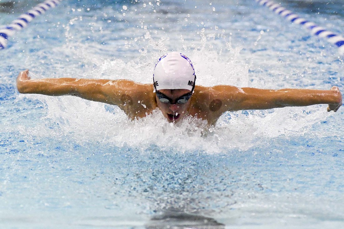 Jay County High School freshman Cooper Glentzer swims the butterfly leg of the 200-yard medley relay that the Patriots won as part of Thursday’s meet against Norwell. While the Patriots fell 169-109, Glentzer was a part of all four of the boys’ victories in the meet. (The Commercial Review/Andrew Balko)