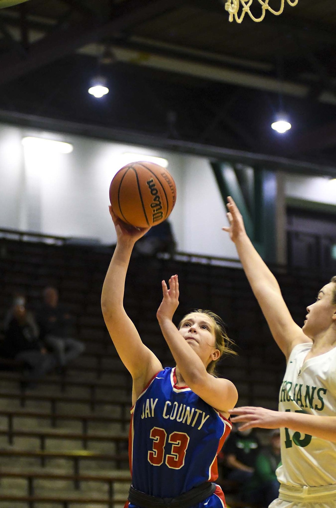 Jay County High School’s Natalie May puts up a layup in the Patriots’ 64-54 overtime win at New Castle on Thursday. The Patriots have now won two games in OT this season and have gotten back above 0.500. (The Commercial Review/Andrew Balko)