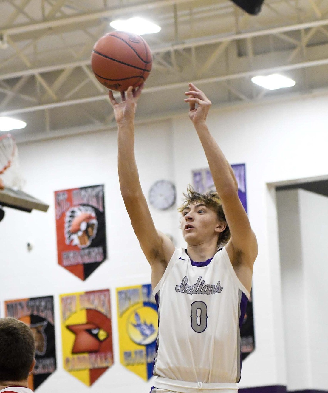 Briggs Overman, a senior on the Fort Recovery High School boys basketball team, pulls up for a mid-range jump shot in the third quarter of Monday’s 63-53 loss to St. Henry in the Ohio 119 Classic. Overman led all scorers with 21 points in the game to help keep the Indians close before the closing minutes. (The Commercial Review/Andrew Balko)