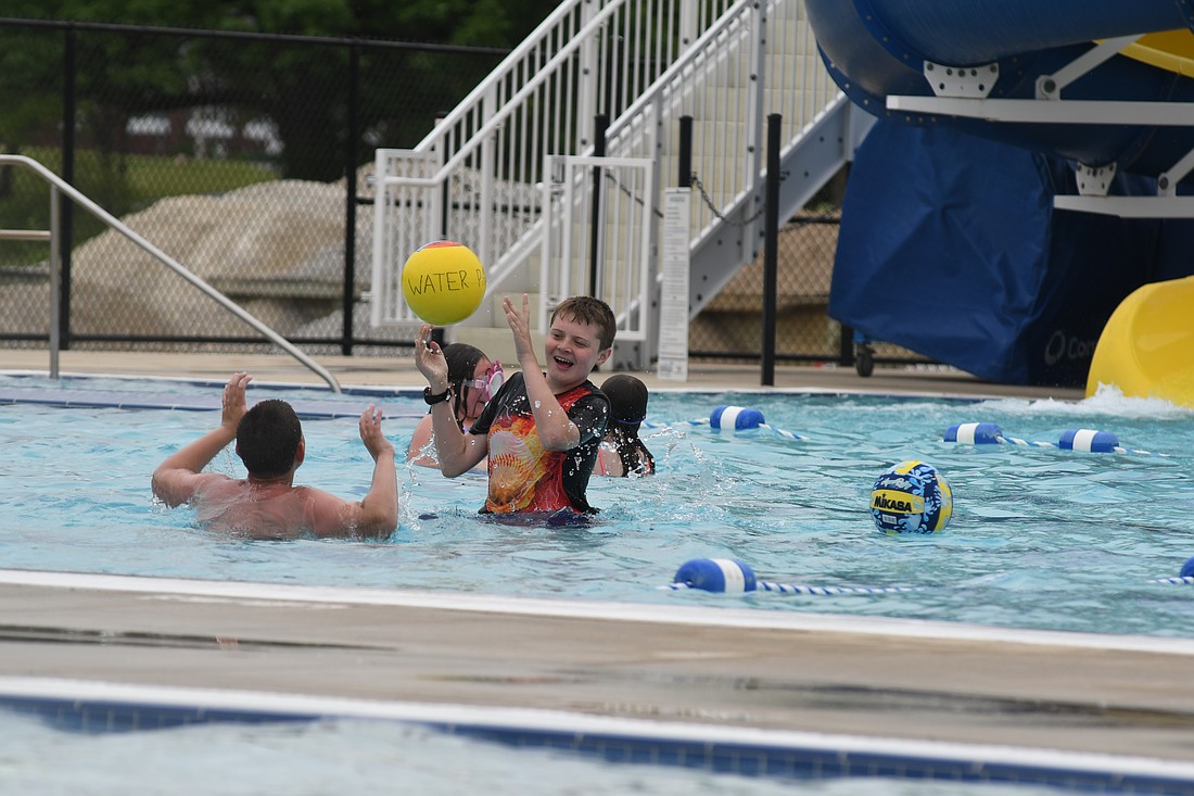 Visitors to Portland Water Park play during the opening weekend of the 2023 season. Portland Park Board discussed the water park during its meeting Tuesday, including repairs to the lily pads and mesh covering above the slide. Park board president Brian Ison asked fellow members to think about admission prices, lifeguard pay rates and various other issues in order to be ready to discuss them at their February meeting. (The Commercial Review/Ray Cooney)