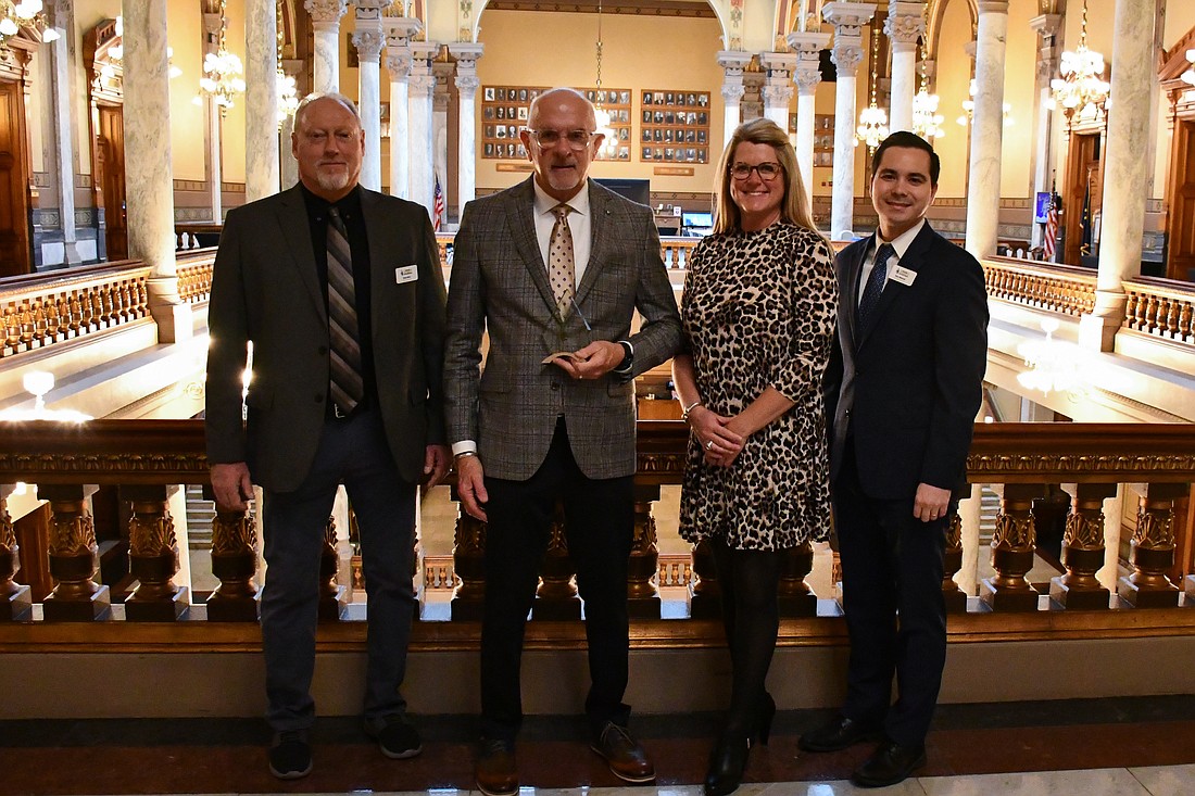 Indiana County Commissioners Board presented State Sen. Travis Holdman (R-Markle), second from left, who represents Jay County, with its Commitment to Excellence Award last month. The award is for “performing at an exemplary level while making notable contributions to advance local government leadership.” (Photo provided)