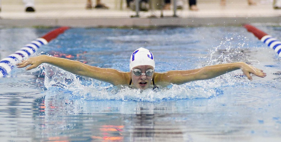 Lauren Fisher of Jay County High School swims the butterfly leg of the 200-yard individual medley in a double dual meet with Celina and Coldwater on Thursday. Fisher finished second in the event and the 100 butterfly, while helping the 200 medley relay team and 200 freestyle relay team to top finishes. The Patriots’ depth lifted them past Celina 152-72 and Coldwater 134-75. (The Commercial Review/Andrew Balko)