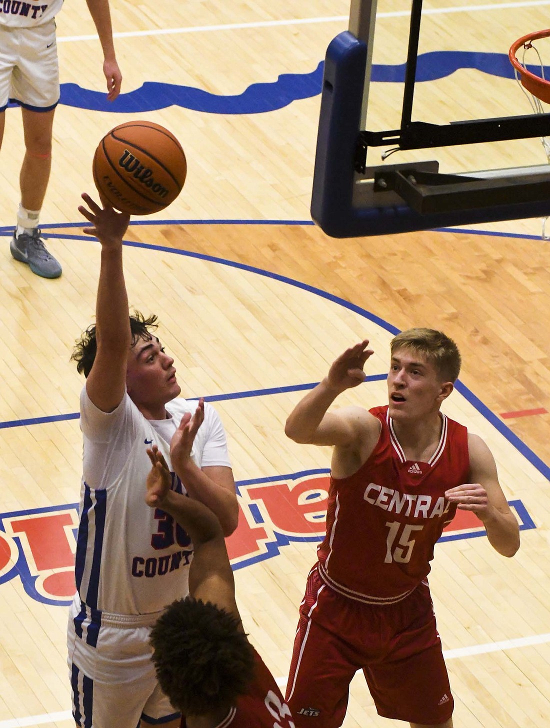 Aiden Phillips of the Jay County High School boys basketball team puts up a bunny during Saturday’s 62-49 win over Adams Central. Phillips and the other forwards combined for 46 points (74.2%) while out-rebounding the Jets 36-19. (The Commercial Review/Andrew Balko)