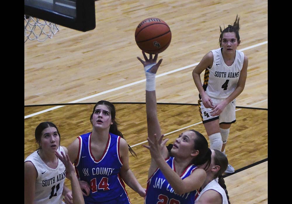 Natalie Carreno of Jay County goes to the basket during the first half of the Patriots' 54-14 win over host South Adams on Tuesday during the opening round of the Allen County Athletic Conference Tournament. Carreno tallied eight points in the victory. (The Commercial Review/Ray Cooney)