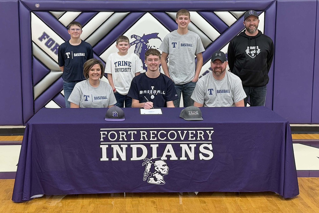 Mason Diller of Fort Recovery High School signed his national letter of intent on Jan. 16 to play baseball at Trine University. Picture in the front row from left are mother Katie, Mason, and father Greg. Back row are brothers Kale, Easton and Garrett and baseball coach Kevin Eyink. (The Commercial Review/Andrew Balko)