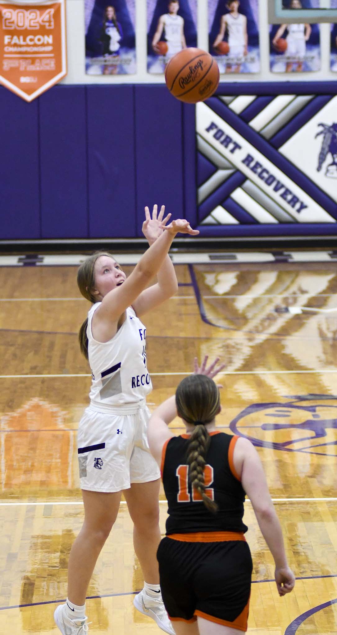 Emma Schmitz puts up a shot during the Fort Recovery High School girls basketball team’s 61-22 victory over Bradford on Saturday. The sophomore scored four points on 2-3 shooting in the win. (The Commercial Review/Ray Cooney)