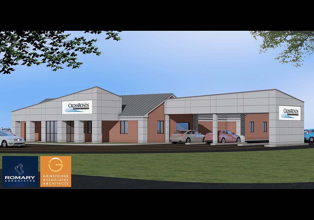 This artist's rendering shows the proposed new look for CrossRoads Financial Federal Credit Union, which plans to start a $1.1 million renovation project this spring. It will involve a new entryway and expanded lobby, as well as improvements to the drive-thru lanes. (Romary Associates)