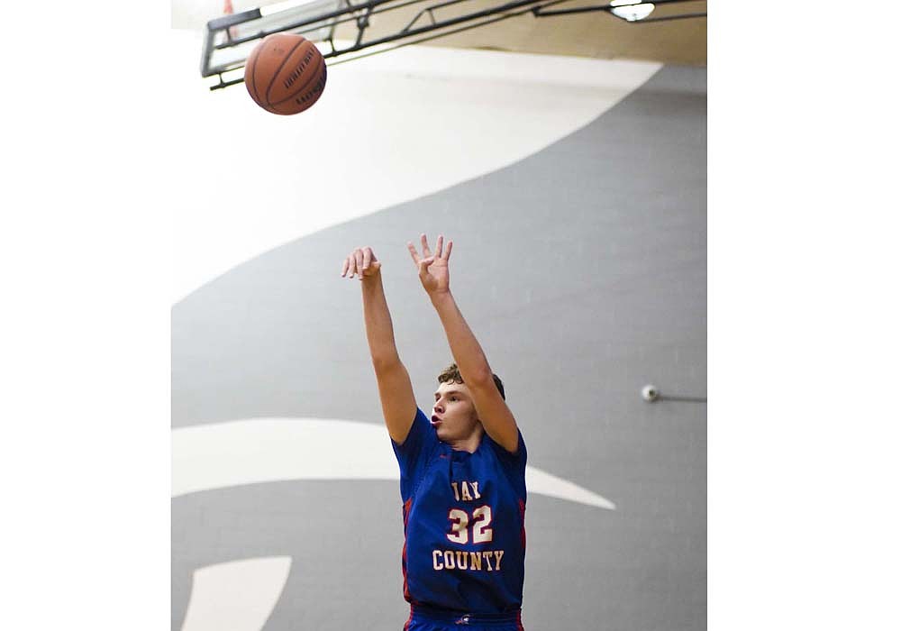 Jay County High School junior Tucker Griffin fires away a three during the Patriots’ 56-41 loss at Blackford on Saturday. Griffin led all players with seven assists in the game. (The Commercial Review/Andrew Balko)