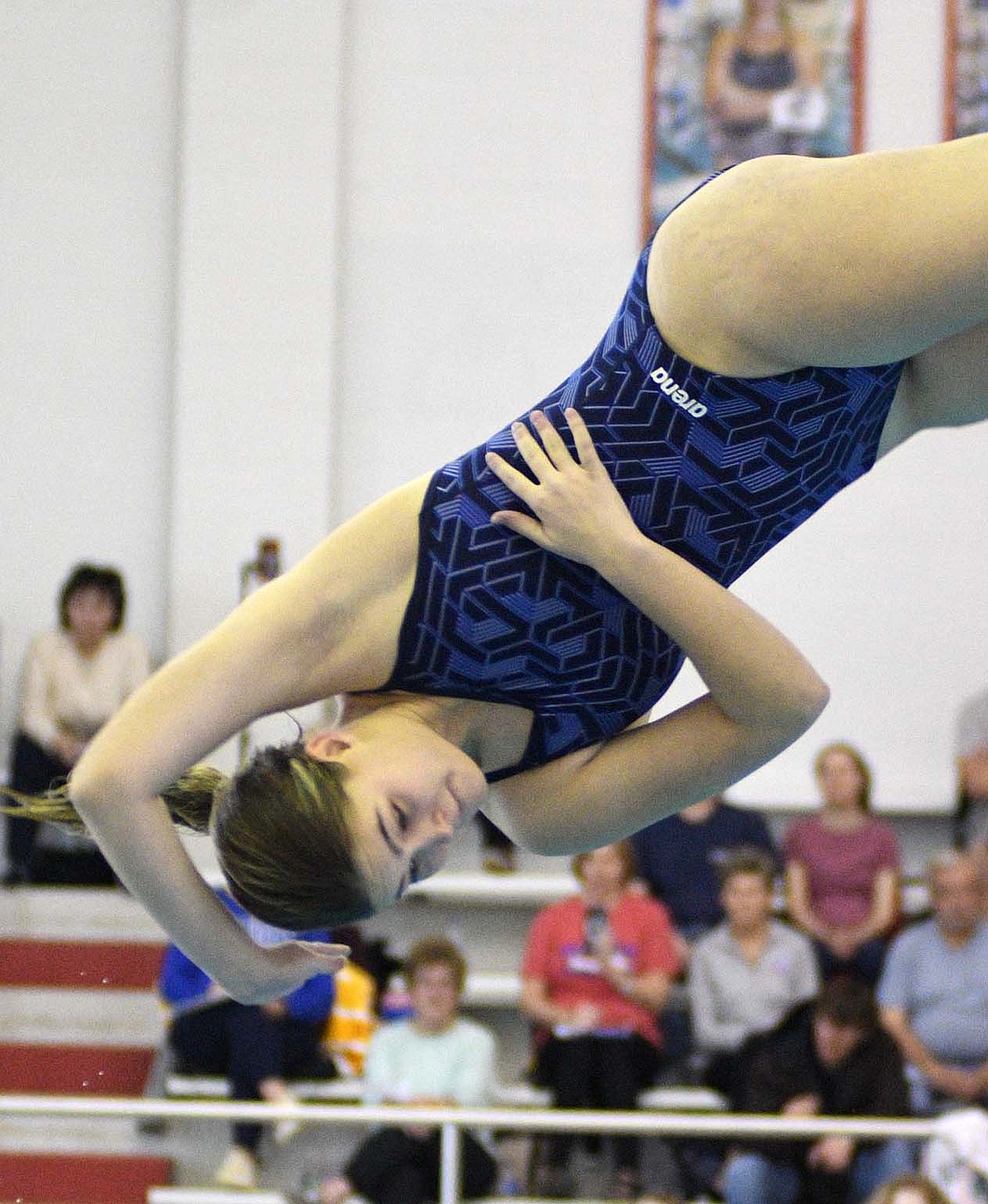 Maddy Snow of Jay County High School twists during the semifinals of the sectional diving competition Saturday morning. Snow finished in fourth place to earn the last regional berth from the sectional at Jay County and will compete at Hamilton Southeastern at 6 p.m. tonight. The swimming portion of the sectional was postponed to Monday night. Pick up Wednesday’s paper for full coverage. (The Commercial Review/Ray Cooney)