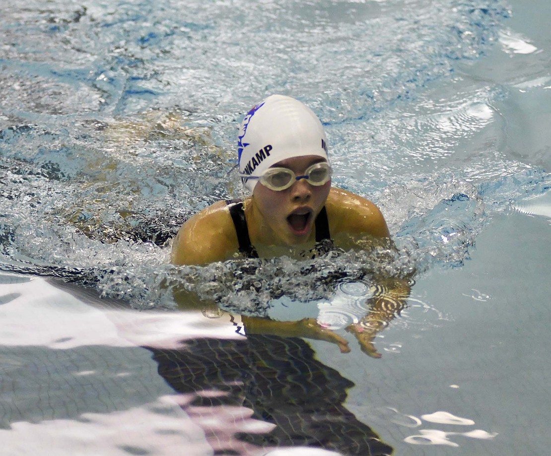 Jay County High School’s Alyvia Muhlenkamp swims the consolation heat of the 100-yard breaststroke during Monday’s sectional that the Patriots hosted. Muhlenkamp finished 14th with a time of 1 minute, 28.1 seconds, in her first sectional appearance. (The Commercial Review/Andrew Balko)