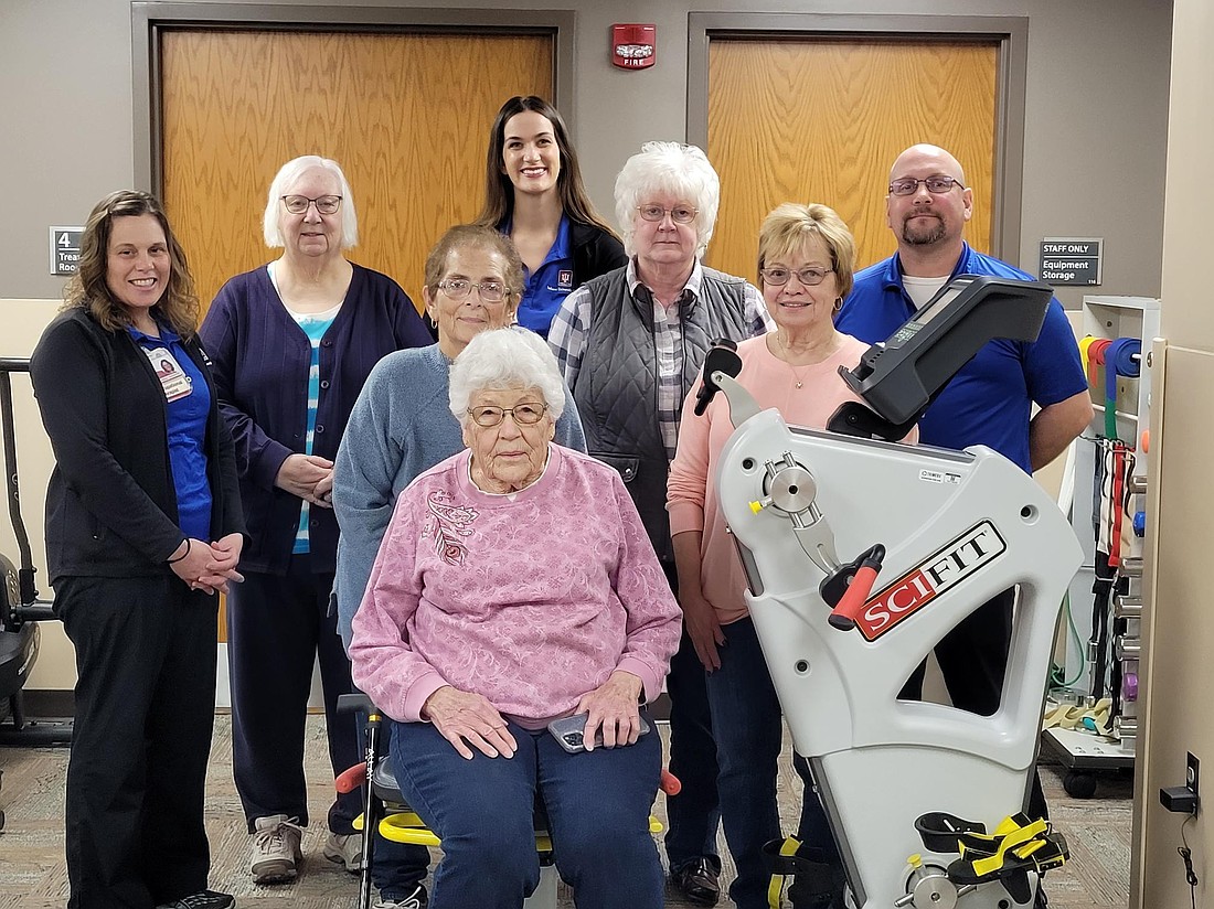 IU Health Jay Auxiliary Board of Directors donated a recumbent exercise bike to IU Jay Physical Therapy Services. Pictured in the front is Betty Haffner. In the second row, from left, are occupational therapist Kelly Minger, Sandy McGraw, Eunice White, physical therapist Macy Whitehair, Margie May, Pat Brockman and rehabilitation services manager Brian Ison. (Photo provided)