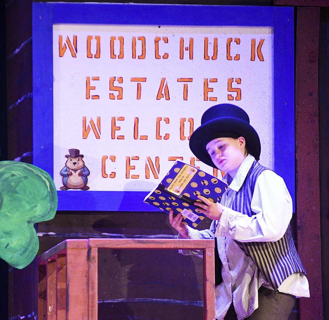 Danielle Wright performs as Willie Montgomery during Tuesday’s rehearsal for the Jay County Junior-Senior High School production of “If a Woodchuck Could Chuck Wood.” Wright also plays “Dr. Justice” Edgar McVee in the show as every cast member plays two characters. (The Commercial Review/Ray Cooney)