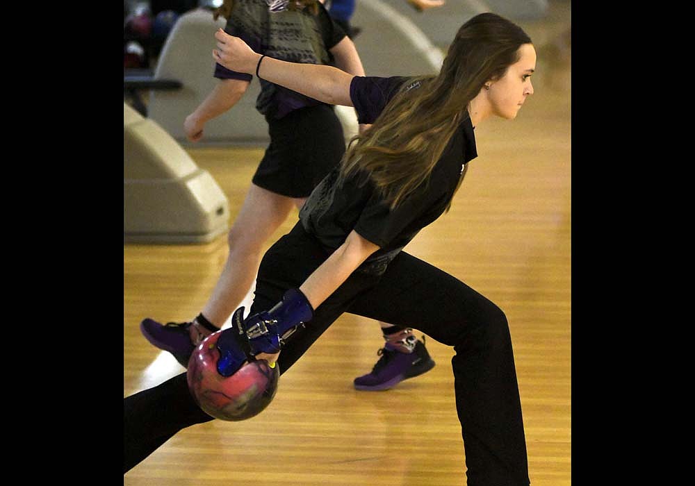 Emily Lauber slides during a practice shot at H.P. Lanes on Friday as the Fort Recovery High School girls bowling team competed at the OHSAA Division II state tournament. The Indians came up short of advancing to bracket play after knocking down 3,268 pins in the qualifying round to place 12th out of 16 teams. Lauber is one of four seniors along with Saidy DeRoo, Kayla Heitkamp and Ella Schoen, who bowled their final tournament for the Tribe. (The Commercial Review/Andrew Balko)