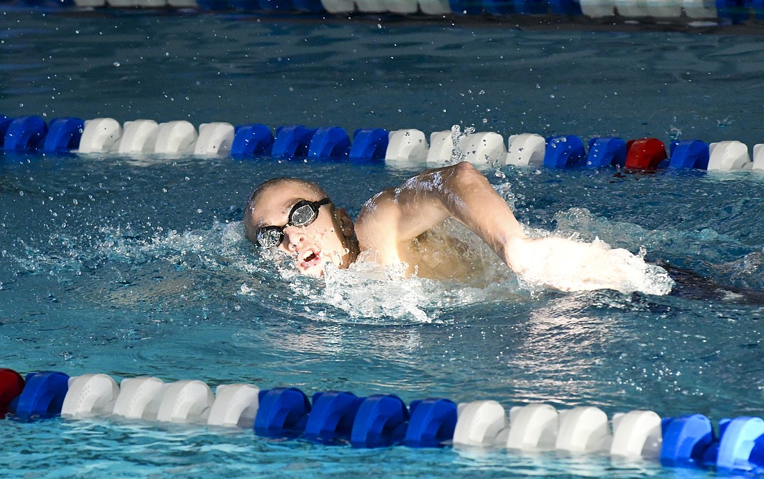 Grant Glentzer of the Jay County Junior High School swim team competes in the 200-yard freestyle during Tuesday’s regular-season finale against South Adams. Glentzer won the event as the Patriot boys won the meet 136-61. (The Commercial Review/Andrew Balko)