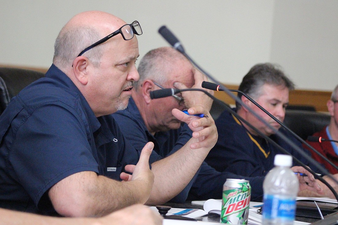 Jay County Council member Bryan Alexander asks questions Wednesday during a joint session between council and Jay County Commissioners. County officials learned about financing options for capital projects from Jason Semler of Baker Tilly. (The Commercial Review/Bailey Cline)