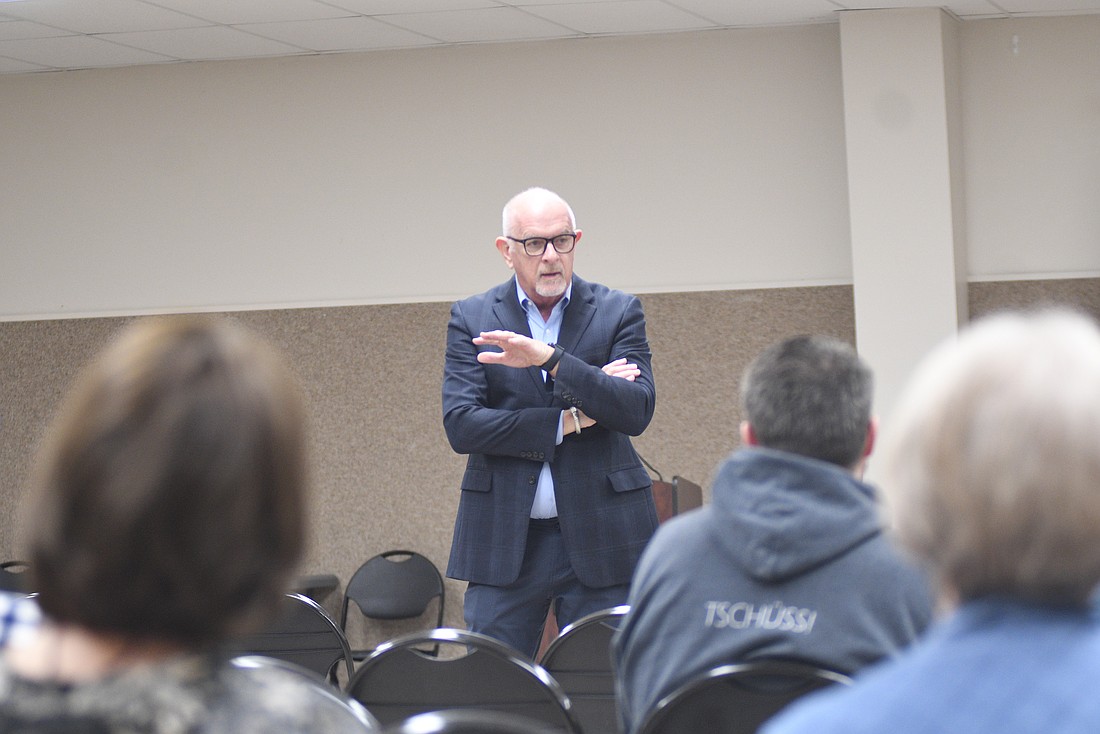 State Sen. Travis Holdman (R-Markle) gestures Saturday while speaking during a legislative update session at West Jay Community Center in Dunkirk. Much of the session revolved around financial issues, including legislation on property taxes, health care costs and grant programs. Following a question from Jay School Corporation superintendent Jeremy Gulley, Holdman committed to fixing an issue that saw projected property tax hits for Jay County and some other counties go up from the original version of the bill to a modified version. (The Commercial Review/Ray Cooney)