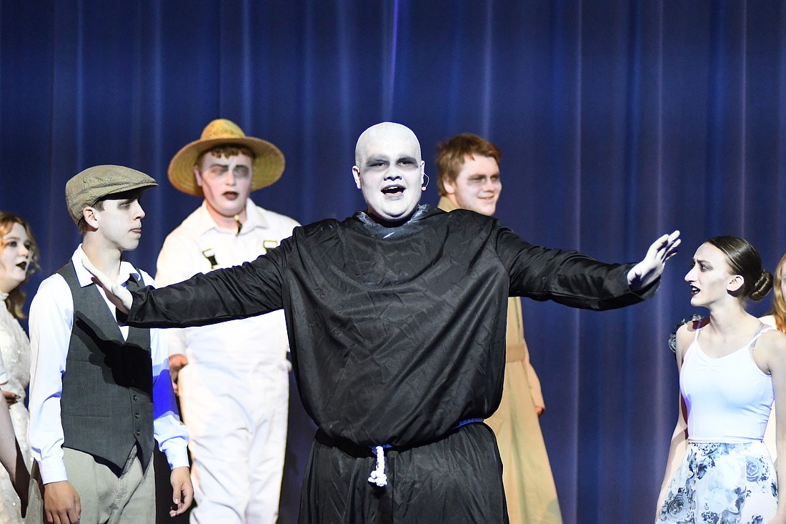 Luke Moser performs as Uncle Fester during Saturday’s rehearsal for the Jay County High School production of “The Addams Family.” The production opens Friday in JCHS auditorium with additional performances on Saturday and Sunday. For a story about the show, see Thursday’s edition of The Commercial Review. (The Commercial Review/Ray Cooney)