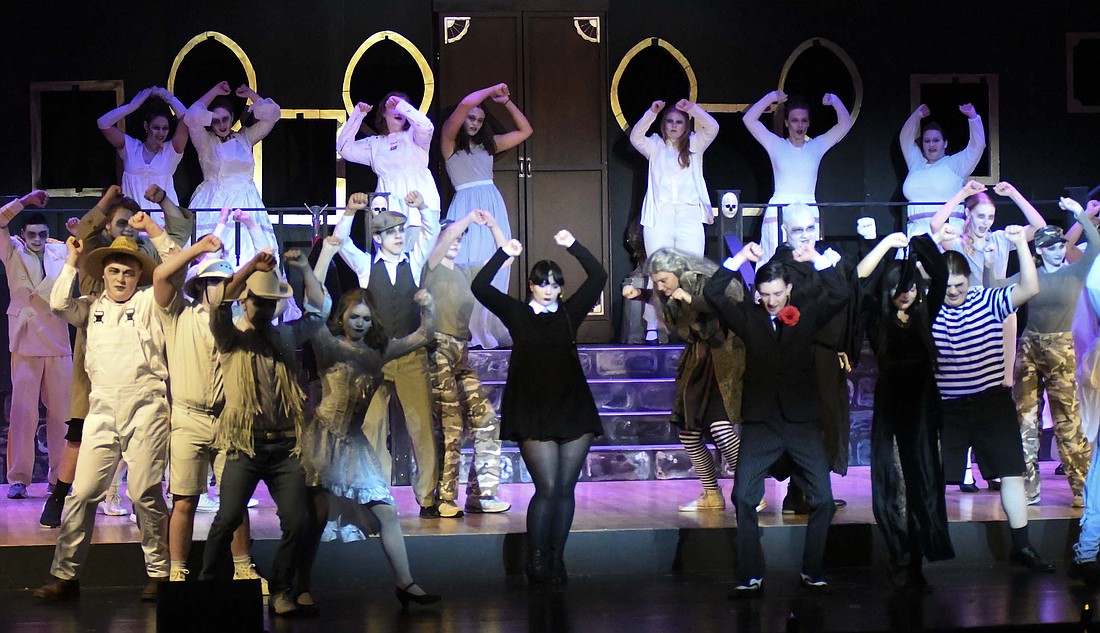 The cast of the Jay County High School choir department’s production of “The Addams Family” rehearses Saturday in preparation for this weekend’s production. Performances are scheduled for 7 p.m. Friday and Saturday as well as 2 p.m. Sunday. Tickets are $7 and will be available at the door. (The Commercial Review/Ray Cooney)