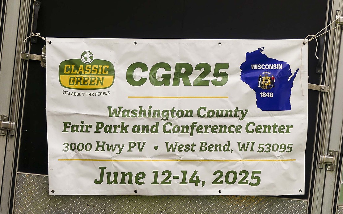 In addition to his personal collection, Mike Wason is also a committee member for Classic Green. Classic Green is an annual John Deere exhibition. Watson had a banner at his site advertising the event. (The Commercial Review/Lindy Mercer)