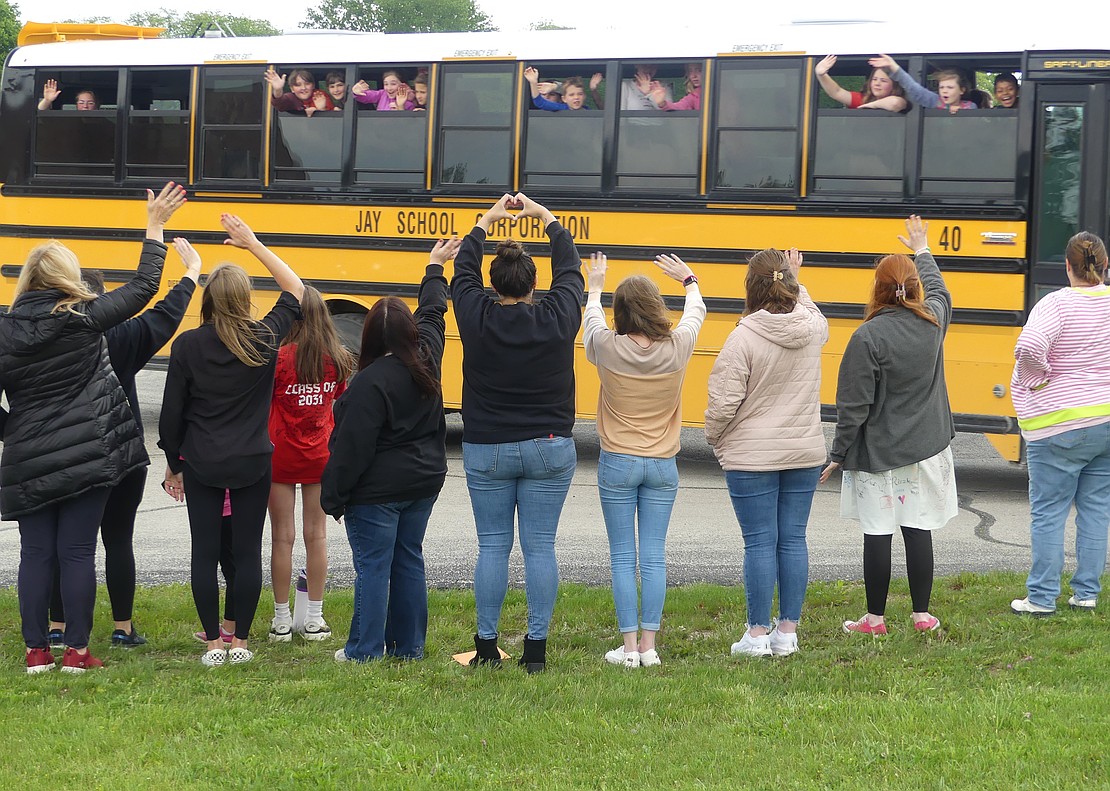 The last day of school at Bloomfield wouldn't be complete without all of the faculty lining the front yard to wave goodbye to their students for the summer. (Lindy Mercer)