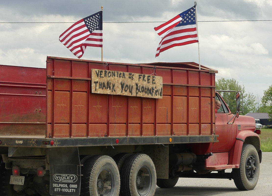 A sign on the Dirksen's truck read "Veronica is free, thank you Bloomfield". (Lindy Mercer)
