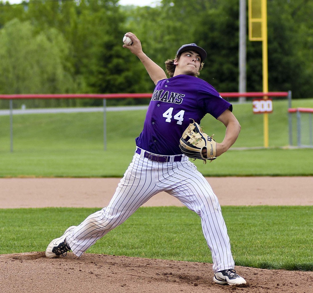 Alex Gaerke of the second-seeded Fort Recovery High School baseball team starts to twist his torso as he fires off a pitch during Friday’s 2-1 victory over Legacy Christian in the OHSAA Division VI Southwest 3 District championship game at Houston. (The Commercial Review/Andrew Balko)