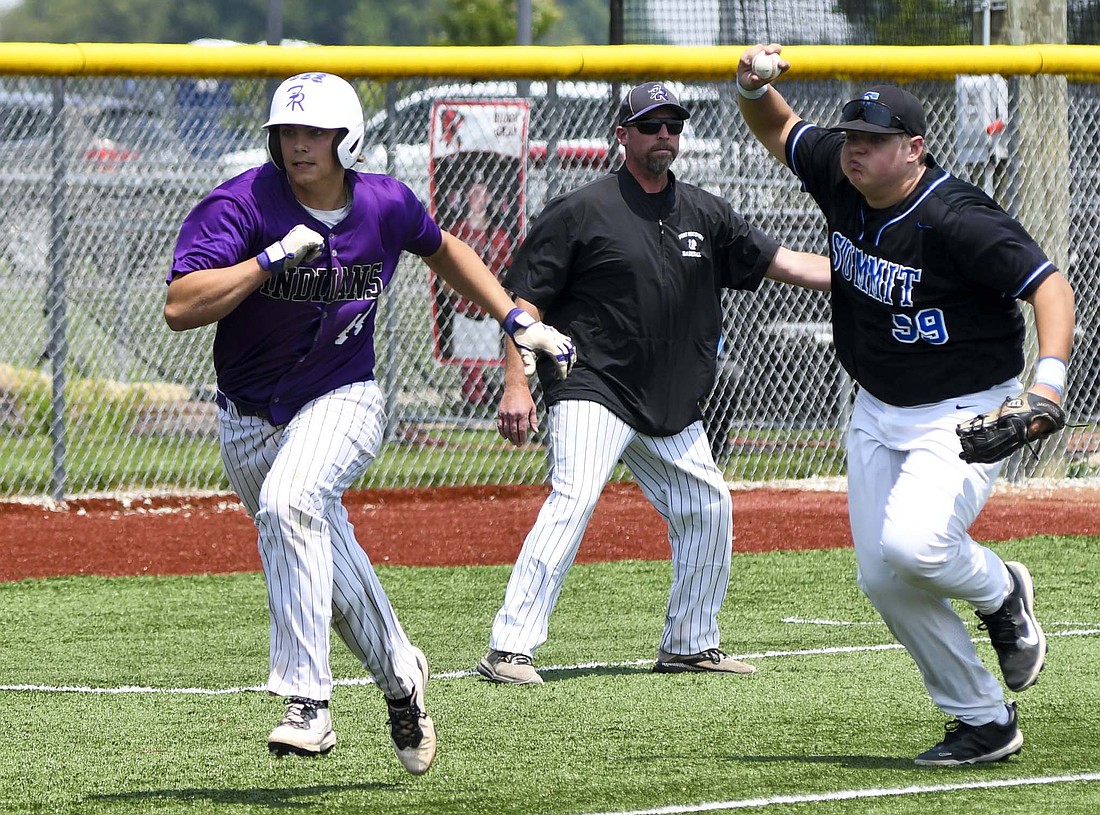 Fort Recovery High School’s Alex Gaerke gets caught in a rundown with Summit Country Day’s Lucas Reder in the OHSAA Division VI Region 24 semifinal at Newton on Tuesday. While Gaerke eventually got tagged out, he was still a key piece in the 6-2 victory with one run, two hits, an RBI and stepping on third base to make three outs to end innings with runners in scoring position. (The Commercial Review/Andrew Balko)