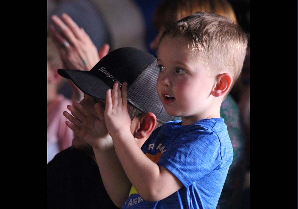 Waylon Shepherd, 4, of Dunkirk, claps as Leo the clown makes his grand entrance Tuesday at the Culpepper & Merriweather Circus in Redkey. (The Commercial Review/Bailey Cline)