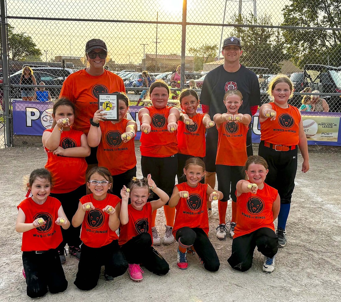 Pictured, players from Wings and Rings of Portland Junior League Rookie softball display their rings after winning both the regular season and tournament titles. (Photo provided)