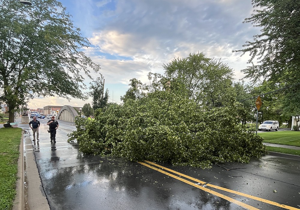 A storm that blew through Portland about 7:30 p.m. Monday resulted in a tree snapping on the property of Trinity Arch Bridge Church in Portland. The tree blocked most of Meridian Street (U.S. 27) just south of the arch bridge. (The Commercial Review/Ray Cooney)