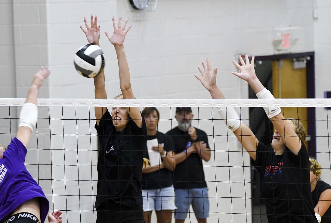 Mya Kunkler of the Jay County High School volleyball team blocks a shot during one of the Patriots’ three scrimmages at Fort Recovery on Wednesday. Kunkler led JCHS with 73 total blocks in 2024. (The Commercial Review/Andrew Balko)