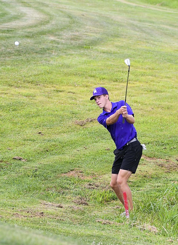 Reece LeFevre of the Fort Recovery High School boys golf team chips onto the first green at Winchester Golf Club during the Indians’ 161-180 victory over Mississinawa Valley on Tuesday. LeFever strung together four consecutive birdies to shoot a one-under-par 35 and earn his fifth match medalist title this season. (The Commercial Review/Andrew Balko)