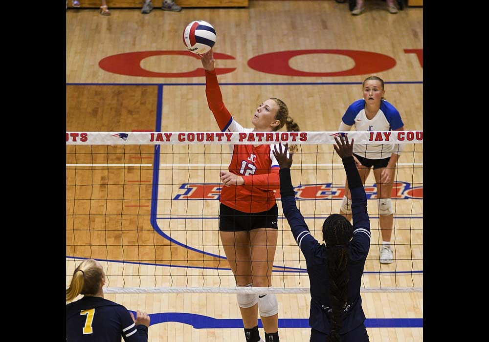 Maria Hemmelgarn of the Jay County High School volleyball team connects for a kill during the fourth set of the Patriots' 22-25, 25-15, 18-25, 25-22, 15-10 loss Thursday to the Delta Eagles. Hemmelgarn and Mya Kunkler each had nine kills for JCHS while Hallie Schwieterman totaled 10. (The Commercial Review/Ray Cooney)