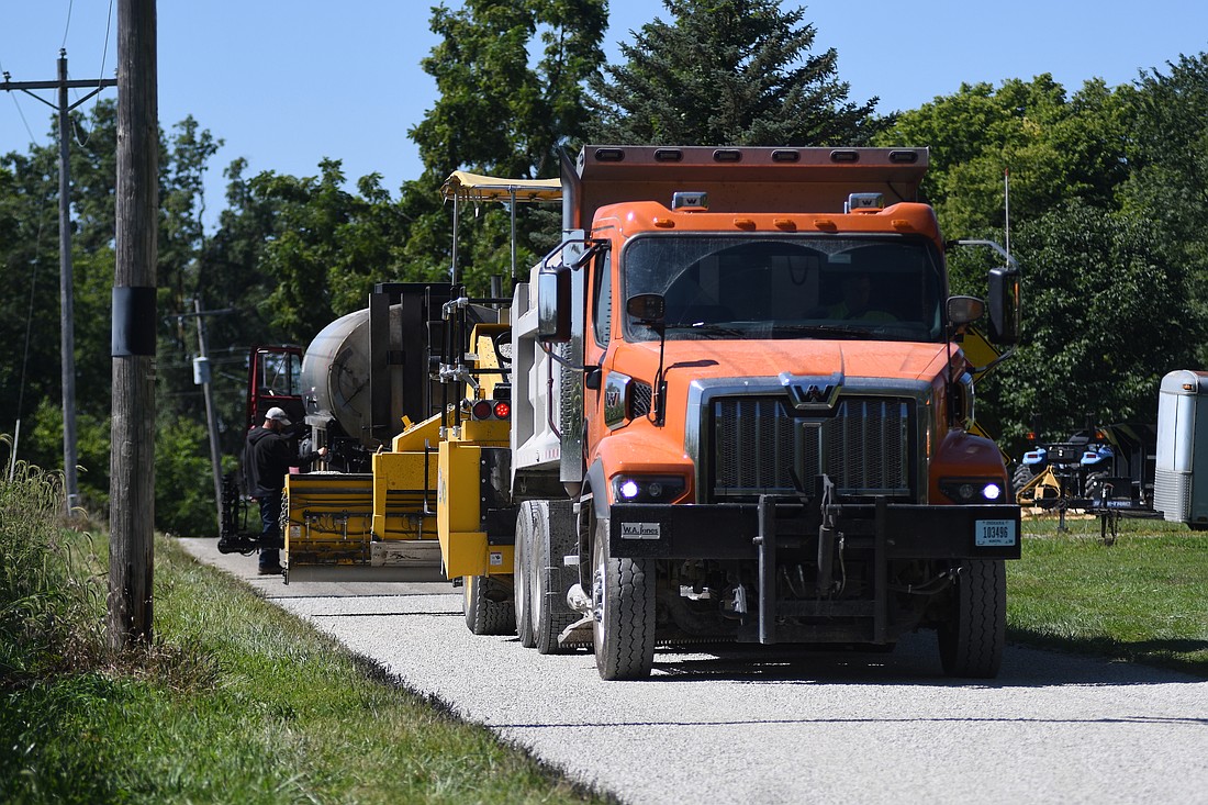 County road 275 South between U.S. 27 and county road 100 West was closed briefly around noon Wednesday to allow Jay County Highway Department crews to work on road repairs. The highway department was also working on county roads 100 West, 200 North, 700 West and 350 South. (The Commercial Review/Ray Cooney)